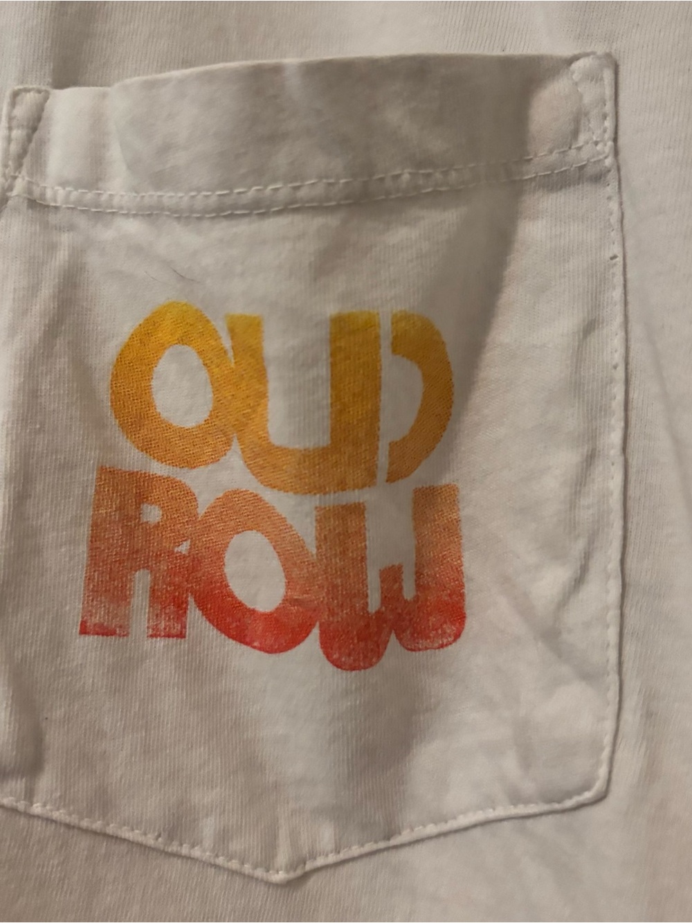 White Pocket Tee with 'OUT NOW' Ombre Print